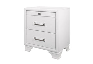The Civic - Nightstand is white and modern, featuring three drawers with sleek silver metal handles. The top drawer is slimmer, and it stands on bracket feet for a minimalist design.