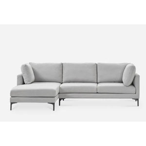 A modern light gray sectional sofa with an L-shaped design, featuring plush cushions and a chaise on the left side. The sofa has sleek black legs and is set against a plain white background.
