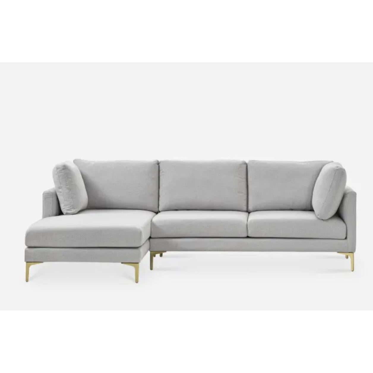 A light gray L-shaped sectional sofa with three back cushions and two side cushions. The sofa features sleek, modern design with gold metal legs, creating an elegant and contemporary look. The orientation is left-facing.