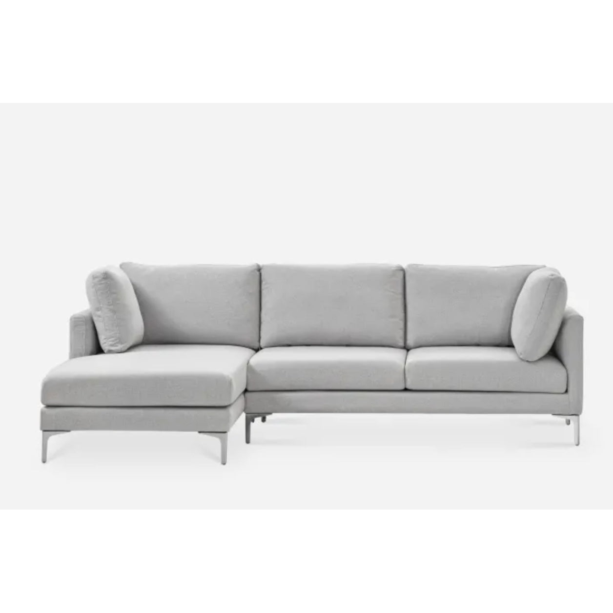 A modern, light gray L-shaped sectional sofa with clean lines. The sofa has three back cushions, a chaise on the left side, and slim metal legs. It sits against a plain white background.