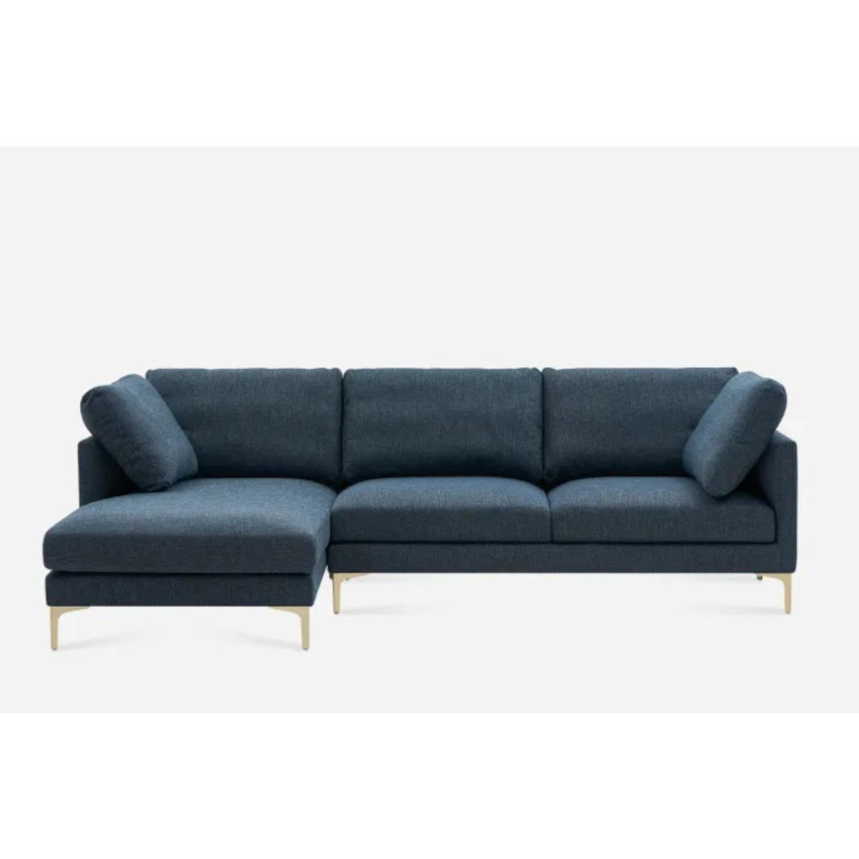 Dark gray sectional sofa with three seat cushions and two back cushions, featuring a chaise on the left side. The sofa rests on sleek, metallic legs, giving it a modern appearance. The background is plain white.