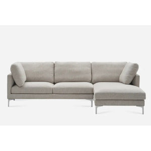 A gray L-shaped sectional sofa with metal legs, featuring three back cushions and a chaise on the right side. The sofa has a modern and minimalist design, set against a plain white background.