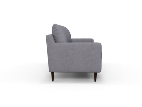 Side view of the Alex Sofa, featuring a modern gray design with a single back cushion and wooden legs, set against a plain white background.