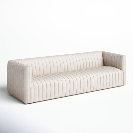 The Brandt 97'' Upholstered Sofa is a modern, beige three-seater featuring vertical stitching and a low backrest, all set against a white background. The design emphasizes clean lines and a contemporary aesthetic.