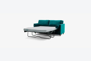 The Briar Sleeper Sofa, in a teal color, features a pull-out mattress with a textured surface. It includes two cushions and rounded armrests, all set against a plain light background.