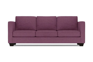 The Catalina Sofa is a three-seater in purple, featuring square arms and a modern design with three cushions and a low profile. It is displayed against a plain white background.