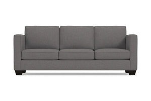 The Catalina Sofa is a stylish grey three-seater featuring square arms and dark wooden legs, all displayed against a plain white background. Its clean lines and modern design make it a chic addition to any space.