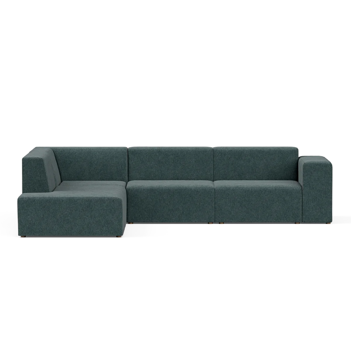 A contemporary Four-Seater Form Sectional in a dark green shade, characterized by its clean lines and low profile. It is arranged on a light-colored surface, consisting of three main sections and an extended chaise to the left, embodying a sleek and minimalist design.