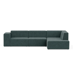 The Four-Seater Form Sectional is a modern, dark teal sectional sofa with a minimalist design. It features a left-hand armrest, three connected seats, and an extended chaise on the right side, positioned against a plain background.