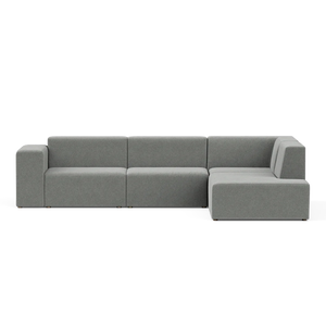The Four-Seater Form Sectional is a contemporary gray sofa with a minimalist design, characterized by clean lines and square cushions. It includes a right-side chaise, offering plenty of seating space.