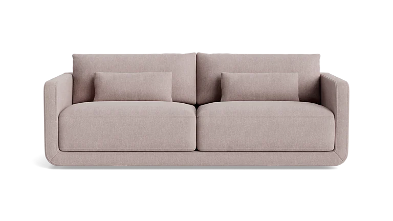 An 85-inch Eva sofa in beige, showcasing clean lines and a minimalist design with two large seat and back cushions, set against a plain black background.