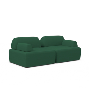 The Magna Preconfigured Sectional is a contemporary-styled, modern sofa featuring wide cushions and a low backrest in a minimalist green design. It boasts blocky armrests and an elegantly sleek appearance, set against a plain white background.