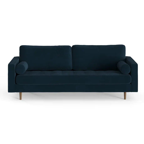 The Geo 84'' Upholstered Sofa is a modern three-seater in dark blue, designed with two back cushions and two cylindrical bolster pillows on each end. It showcases a minimalist style with wooden legs and is set against a white background.