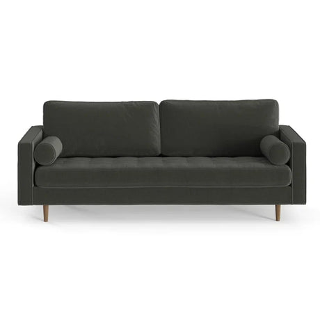 Introducing the Geo 84'' Upholstered Sofa, a contemporary piece in dark green with wooden legs. It boasts a sleek, minimalist design featuring two square back cushions and complemented by cylindrical bolster pillows on each side.