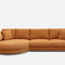 A large, modern sectional sofa upholstered in a textured, burnt orange fabric. The left side features a rounded chaise, and several matching cushions are placed on the backrests. The sofa is set against a plain white background.