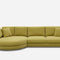 A modern, olive-green sectional sofa with a left-facing curved chaise and four back cushions. The design is sleek, with plush seating, set against a plain white background.