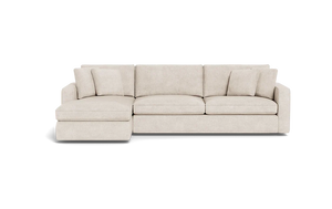 The James 3 Seat Left Chaise 92" Sectional is a beige sofa with an extended left-side chaise, three seat cushions, multiple back cushions, and is showcased against a black background. Its modern and minimalist design highlights clean lines.