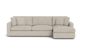 The James 3 Seat Left Chaise 92" Sectional is a beige L-shaped sofa with three cushions. It boasts clean lines and plush seating, featuring a left-side chaise lounge and a modern design. Its neutral color offers versatility for various decor styles.