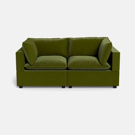 The Kova Pillow Cushion Sofa 86" is a modern, boxy loveseat in olive green with plush cushions and a minimalist design, shown against a plain white background.