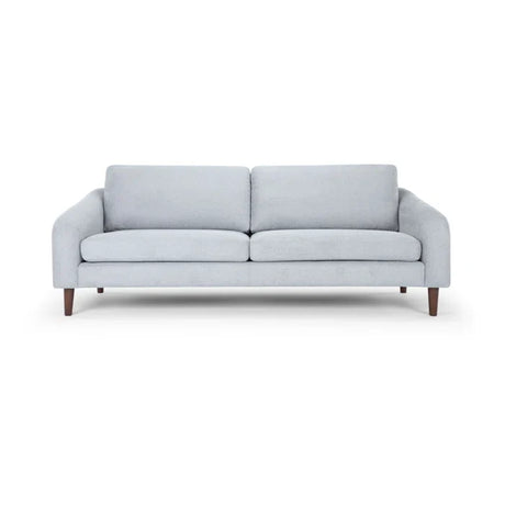 Introducing the Lana 85'' Upholstered Sofa: This minimalist piece comes in a light gray finish and captures mid-century modern style with its wooden legs. The sofa is designed with two seat cushions and two backrest cushions for ultimate comfort.