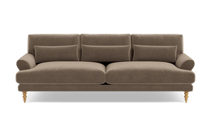 The Maxwell Custom Sofa is a brown, three-seater featuring tufted back cushions and two seat cushions. It is designed with rolled arms and wooden legs that sport a decorative turned design. The sofa is displayed against a plain, white background.
