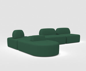 The Magna Preconfigured Sectional is a modern, modular green sofa set with rounded edges, arranged in two sections against a white background. Its integrated backrests and varied shapes create a contemporary and versatile seating area.