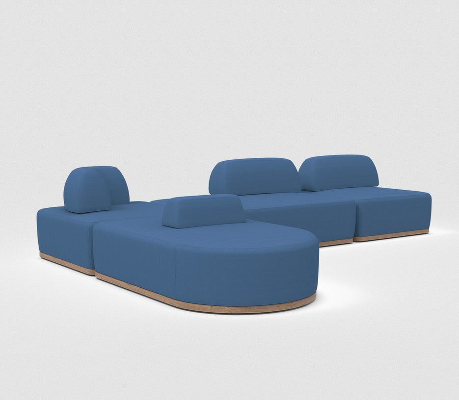 Two Magna Preconfigured Sectional sofas in blue, featuring rounded backrests and wooden bases, are set against a white background. The modern and minimalist design allows for rearranging sections to create various configurations.