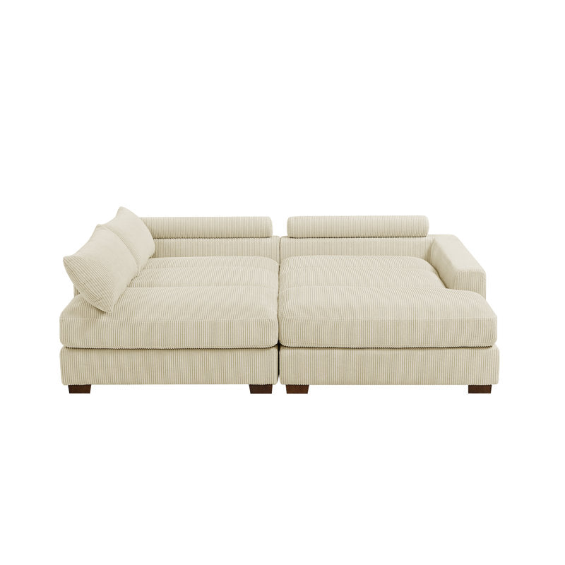 The Etta Avenue Mordecai 90'' Square Arm Sofa boasts a modern design with its spacious, cream-colored sectional style featuring a luxurious corduroy texture. It comes with multiple cushions and low armrests across two main sections for ample seating space, all set against a plain white background.