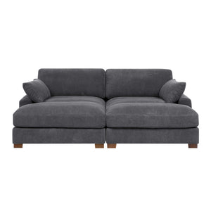 The Etta Avenue Mordecai 90'' Square Arm Sofa is a modern gray corduroy sectional with two seat cushions, two back cushions, and two side pillows. It features short wooden legs and offers a cozy, minimalist design ideal for contemporary living spaces.