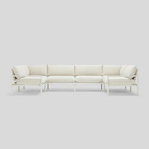 The Terra Sectional is a white, modern sofa with a metal frame and cushioned seats, organized in an L-shape on a light gray background.