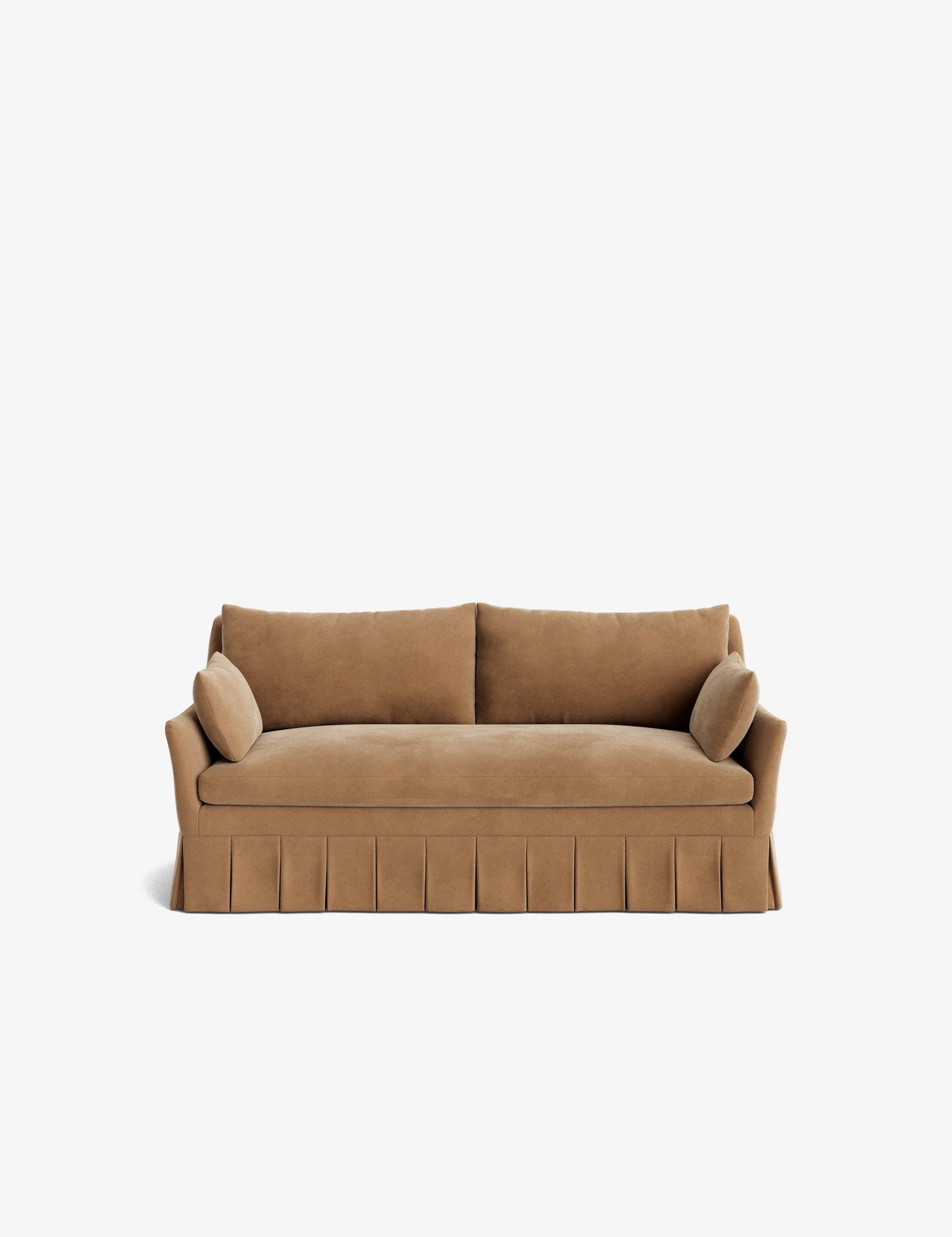 The Portola Pleated Sofa is a brown piece featuring a skirted bottom and is accompanied by two matching round pillows, showcasing a minimalist design with a straight backrest and armrests, all set against a plain white background.