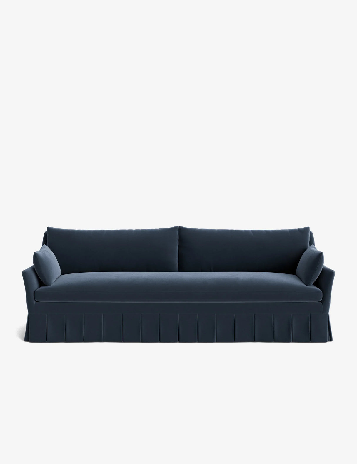 The Portola Pleated Sofa is a sleek, dark blue piece with a pleated skirt, featuring two back cushions and two bolster pillows on each end, all set against a plain white background.