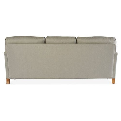 Back view of the Brooke 6-Seat Sofa in light gray, featuring three cushioned sections and wooden legs, set against a white background.