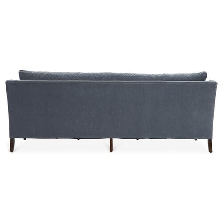 Back view of the Margot Velvet Sofa, highlighting its sleek and minimalist design with wooden legs.