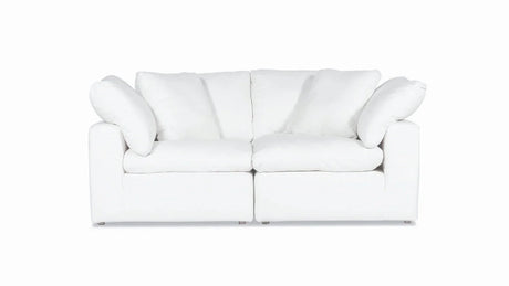 A Movie Night 3-Piece Modular Sofa in white, featuring plush cushions and a contemporary design, set against a plain white background. This cozy sofa offers seating for two and includes four large cushions for added comfort.