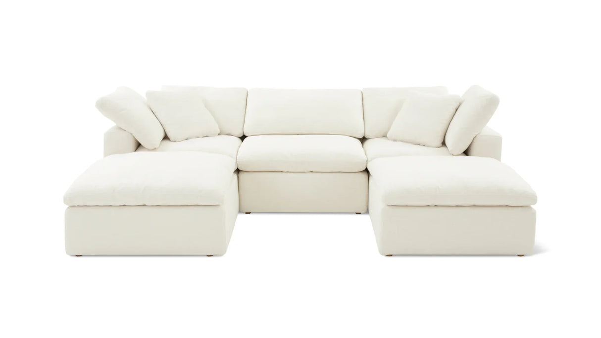 The Movie Night 3-Piece Modular Sofa, a white sectional with a modern design, includes multiple cushions and a chaise lounge at each end, all displayed against a simple white backdrop.