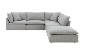 Introducing the Chill Time 4-Piece Modular Sectional, a spacious sectional sofa in light gray with a contemporary design. It features multiple cushions and a chaise lounge, forming a cozy L-shape. The sectional is set against a plain white background.