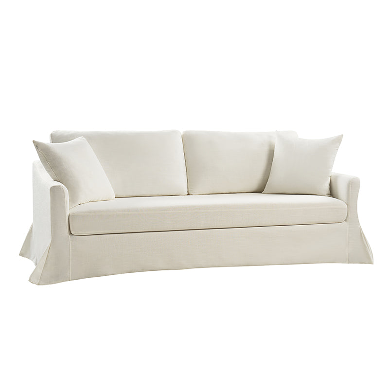 The Torsten Modern Comfortable Sofa features a cream color with a skirted base, three seat cushions, and two matching throw pillows set against a white background. Its classic and elegant design makes it a perfect addition to any living space.