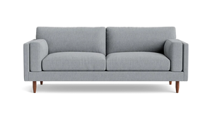Discover the Skinny Fat 85" Sofa Standard Depth, a contemporary piece in light gray that features two seat cushions and two backrest cushions. With its straight, simple armrests and wooden legs, this sofa embodies a minimalist design. The transparent background accentuates its sleek appearance.