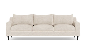The Sloan Custom 3-Seat 95" Sofa features a beige upholstery with smooth finish, complemented by three plush and comfortable cushions. It has straight armrests and stands on four dark legs, all set against a white background.