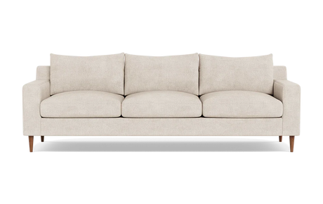 The Sloan Custom 3-Seat 95" Sofa features a beige finish, plush cushions, and wooden legs on a black background. It boasts a modern, minimalist design with clean lines.