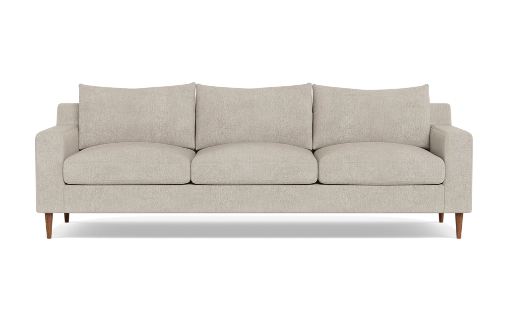 The Sloan Custom 3-Seat 95" Sofa is a modern beige sofa featuring streamlined, rectangular cushions and slim wooden legs, positioned against a plain black background.