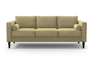 The Samson Sofa is a beige, three-seater with a minimalist design, featuring rectangular cushions and bolster pillows on each end. It has dark wooden legs and is set against a plain white background.