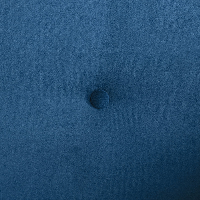 Close-up of the button-tufted blue fabric surface of the Serta Monroe Full Size Convertible Sofa, highlighting the detailed texture with a centered button.