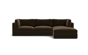 The Tatum Modular 3 Seat Chaise 106" Sectional is a dark brown piece featuring three seat cushions and a chaise lounge on the right. It boasts clean lines and a plush appearance, set against a plain black background.