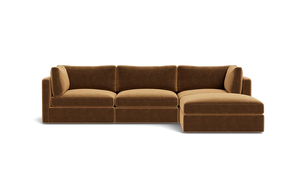 The Tatum Modular 3 Seat Chaise 106" Sectional features a rich brown hue with plush cushions and a right-side chaise lounge, all showcased against a plain black background.