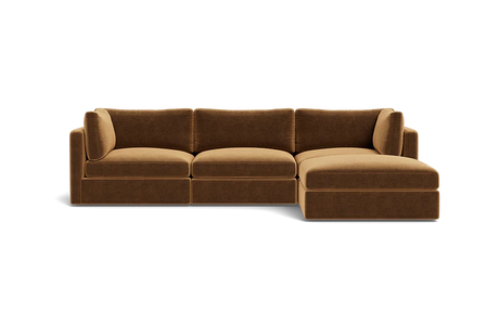 The Tatum Modular 3 Seat Chaise 106" Sectional features a rich brown hue with plush cushions and a right-side chaise lounge, all showcased against a plain black background.