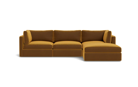 Introducing the Tatum Modular 3 Seat Chaise 106" Sectional, a modern sectional sofa in a striking mustard color. It features three seat cushions and an attached chaise lounge with clean lines, rectangular armrests, and a minimalist design set against a black background.