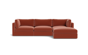 The Tatum Modular 3 Seat Chaise 106" Sectional, featuring deep brown cushions and a chaise lounge attachment on the right, set against a black background.