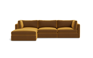 A Tatum Modular 3 Seat Chaise Sectional in mustard yellow, showcasing clean lines and plush cushions against a plain black background, features a left-side chaise for a sleek and modern design.